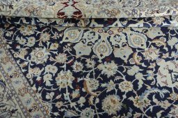 Close-up detail of New Nain rug from Iran / Persia showing Wool weave
