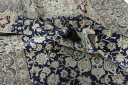Surface texture of New Nain rug with natural Wool and intricate pattern