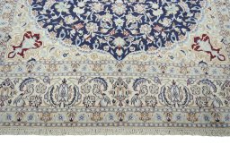 Full view of New Nain rug from Iran / Persia, 323 × 230 cm in Blue tones