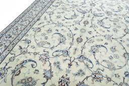 Backside of handmade New Nain rug showing knot structure and weave density