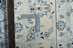 Surface texture of New Nain rug with natural Wool and intricate pattern