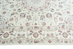 Corner detail of New Nain rug showing border pattern and Wool pile