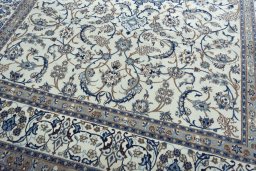 Close-up detail of 2000s Nain rug from Iran / Persia showing Wool weave