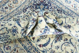 Surface texture of New Nain rug with natural Wool and intricate pattern