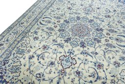 Backside of handmade New Nain rug showing knot structure and weave density
