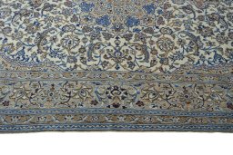 Corner detail of New Nain rug showing border pattern and Wool pile