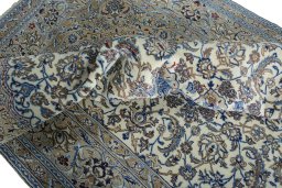Surface texture of New Nain rug with natural Wool and intricate pattern