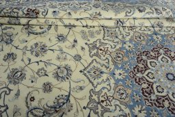 Surface texture of New Nain rug with natural Wool and intricate pattern