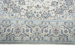 Full view of New Nain rug from Iran / Persia, 348 × 251 cm in Beige tones