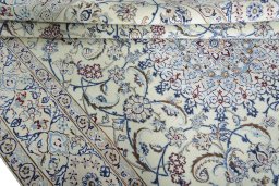Close-up detail of New Nain rug from Iran / Persia showing Wool weave