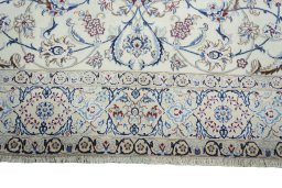 Full view of New Nain rug from Iran / Persia, 310 × 195 cm in Beige tones