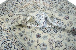 Surface texture of New Nain rug with natural Wool and intricate pattern