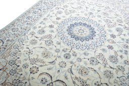Backside of handmade New Nain rug showing knot structure and weave density