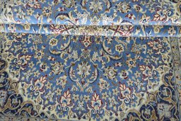 Close-up detail of 2000s Nain rug from Iran / Persia showing Wool weave