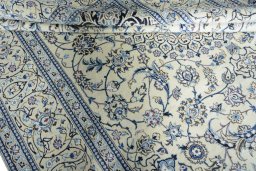 Close-up detail of New Nain rug from Iran / Persia showing Wool weave
