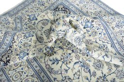 Surface texture of New Nain rug with natural Wool and intricate pattern