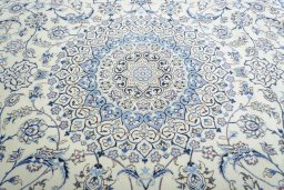 Central medallion detail of New Nain rug from Iran / Persia