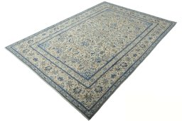 Corner detail of New Nain rug showing border pattern and Wool pile