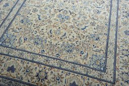 Close-up detail of New Nain rug from Iran / Persia showing Wool weave