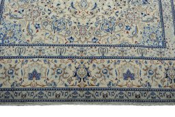 Full view of New Nain rug from Iran / Persia, 314 × 215 cm in Beige tones