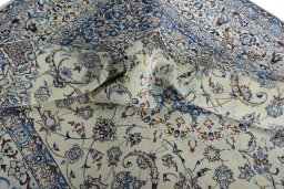 Surface texture of New Nain rug with natural Wool and intricate pattern