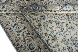 Close-up detail of New Nain rug from Iran / Persia showing Wool weave