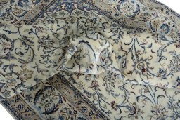 Surface texture of New Nain rug with natural Wool and intricate pattern