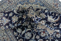 Surface texture of New Nain rug with natural Wool and intricate pattern