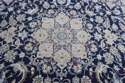 Central medallion detail of New Nain rug from Iran / Persia