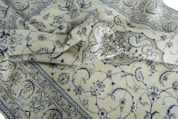 Surface texture of New Nain rug with natural Wool and intricate pattern