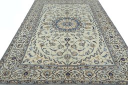 Surface texture of New Nain rug with natural Wool and intricate pattern