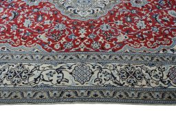Corner detail of New Nain rug showing border pattern and Wool pile