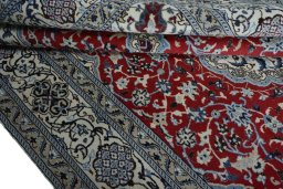 Close-up detail of New Nain rug from Iran / Persia showing Wool weave