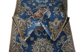 Corner detail of New Nain rug showing border pattern and Wool pile