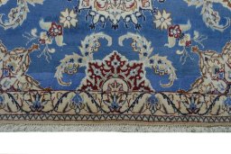 Central medallion detail of New Nain rug from Iran / Persia