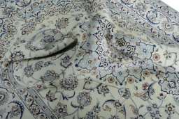 Surface texture of New Nain rug with natural Silk and intricate pattern