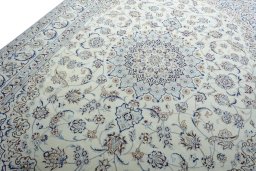 Backside of handmade New Nain rug showing knot structure and weave density