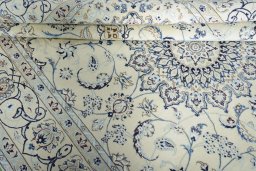 Close-up detail of New Nain rug from Iran / Persia showing Wool weave
