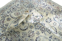 Surface texture of New Nain rug with natural Wool and intricate pattern