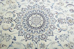 Central medallion detail of New Nain rug from Iran / Persia