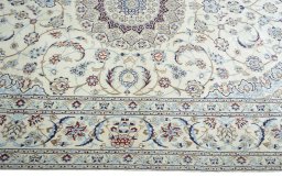 Corner detail of New Nain rug showing border pattern and Wool pile