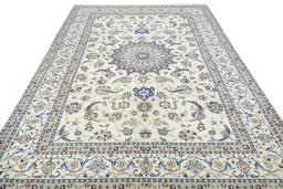 Surface texture of New Nain rug with natural Wool and intricate pattern