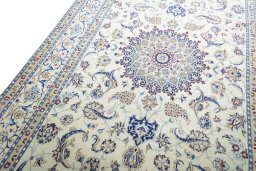 Backside of handmade New Nain rug showing knot structure and weave density