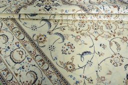 Close-up detail of New Nain rug from Iran / Persia showing Wool weave