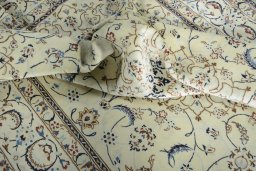 Surface texture of New Nain rug with natural Wool and intricate pattern