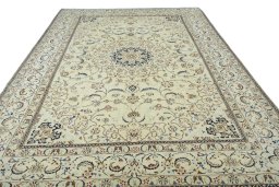 Surface texture of New Nain rug with natural Wool and intricate pattern
