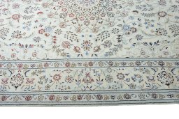 Corner detail of New Nain rug showing border pattern and Wool pile