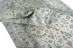Surface texture of New Nain rug with natural Wool and intricate pattern
