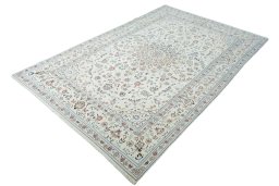 Corner detail of New Nain rug showing border pattern and Wool pile