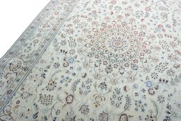 Backside of handmade New Nain rug showing knot structure and weave density